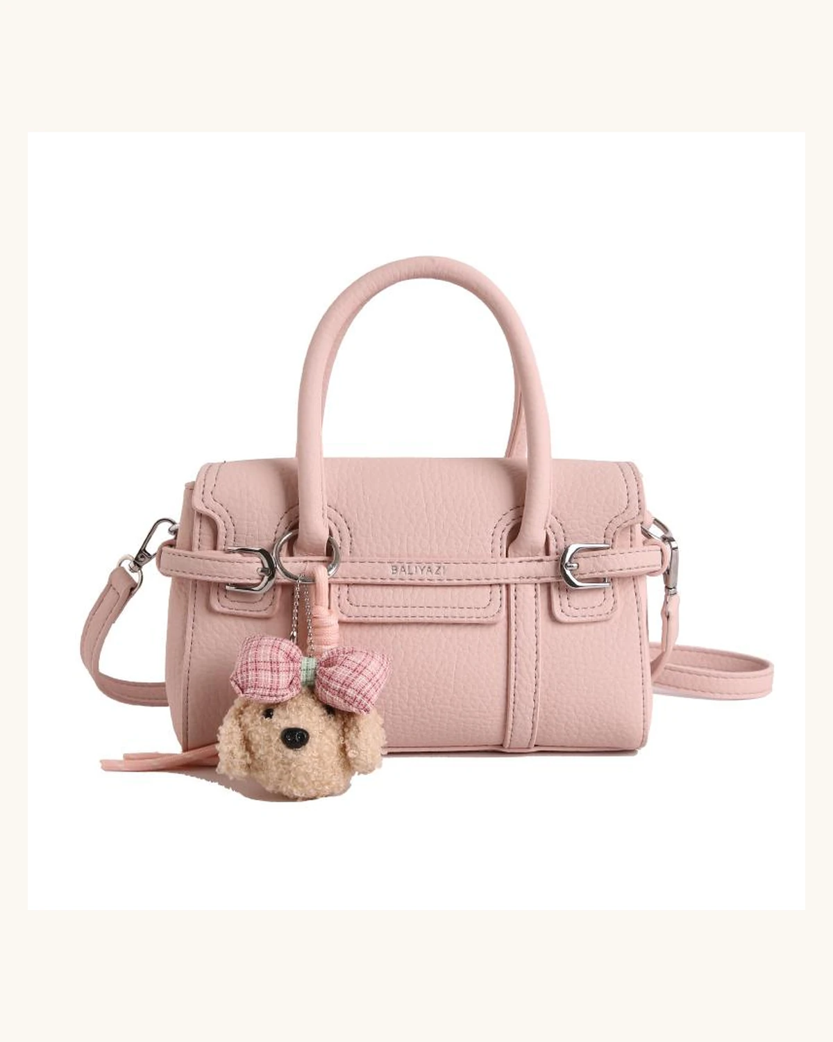 Pink structured handbag with plush charm
